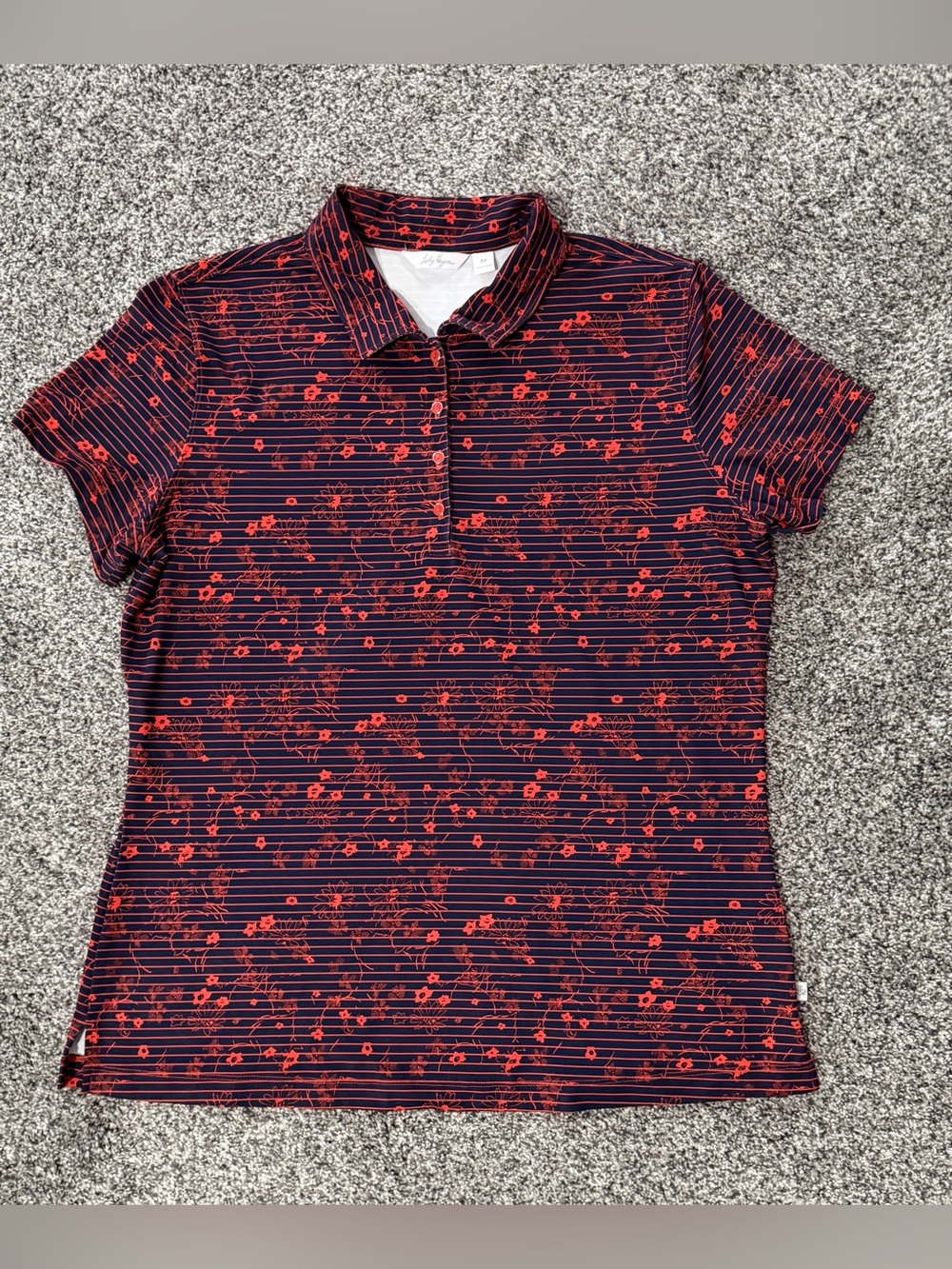 Lady Hagan red/orange & navy striped polo shirt with floral and leaf motifs
